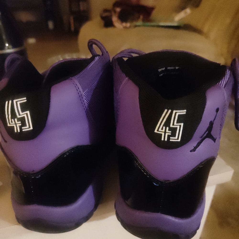 Air Jordan 11s Purple and Black Sneakers - Picture 3 of 4